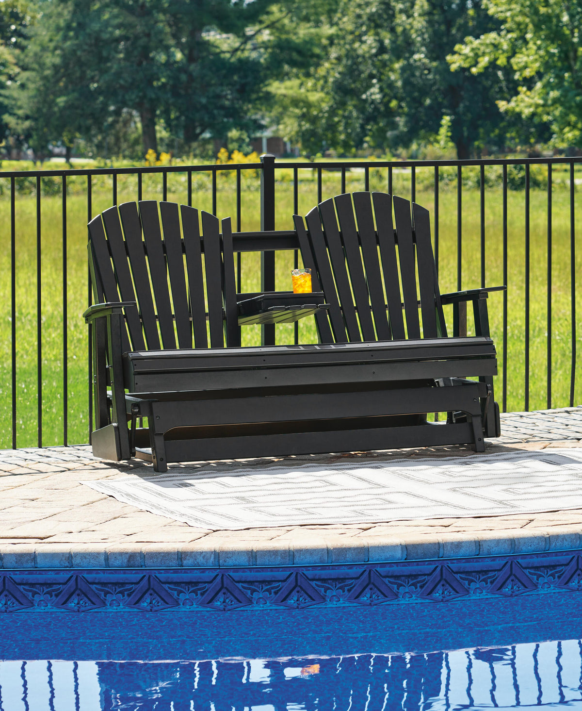 Hyland wave Outdoor Glider Loveseat - Jack’s Furniture and More (Laredo, TX)