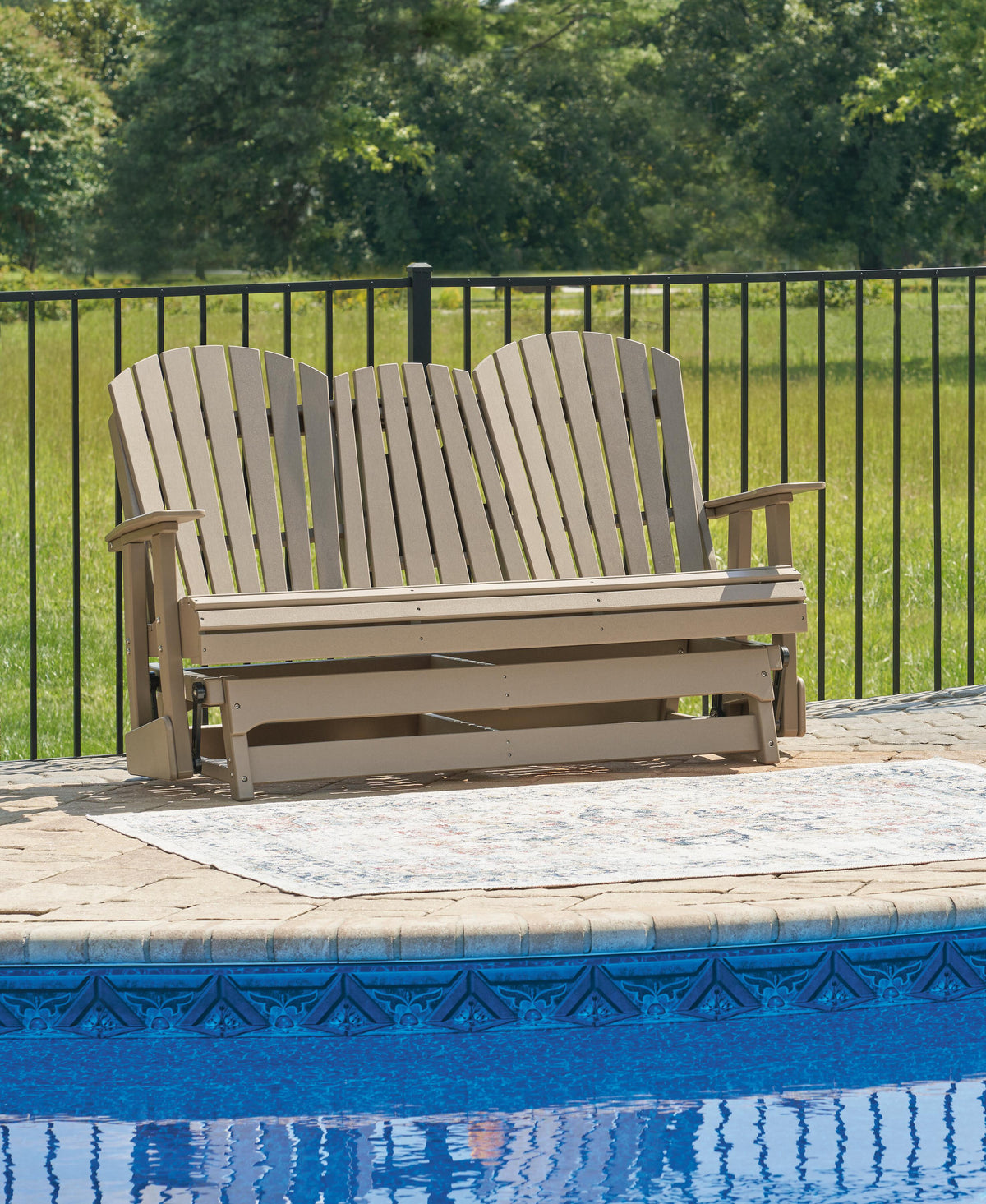 Hyland wave Outdoor Glider Loveseat - Jack’s Furniture and More (Laredo, TX)