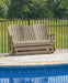 Hyland wave Outdoor Glider Loveseat - Jack’s Furniture and More (Laredo, TX)