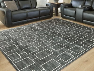 Elderland Washable 7'6" x 9'6" Area Rug - Jack’s Furniture and More (Laredo, TX)