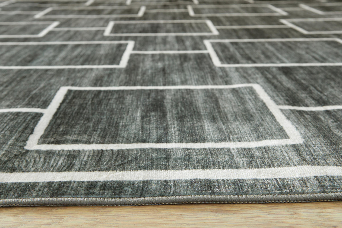 Elderland Washable 5' x 7' Area Rug - Jack’s Furniture and More (Laredo, TX)
