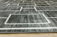 Elderland Washable 7'6" x 9'6" Area Rug - Jack’s Furniture and More (Laredo, TX)
