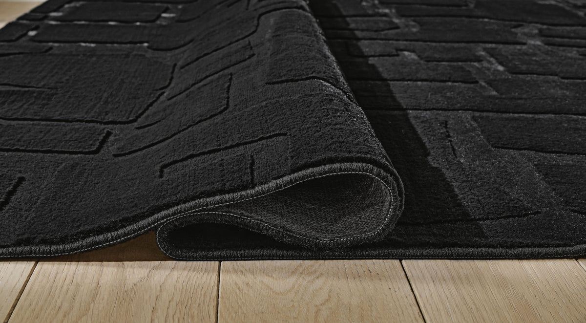 Gibbswell Washable 5' x 7' Area Rug - Jack’s Furniture and More (Laredo, TX)