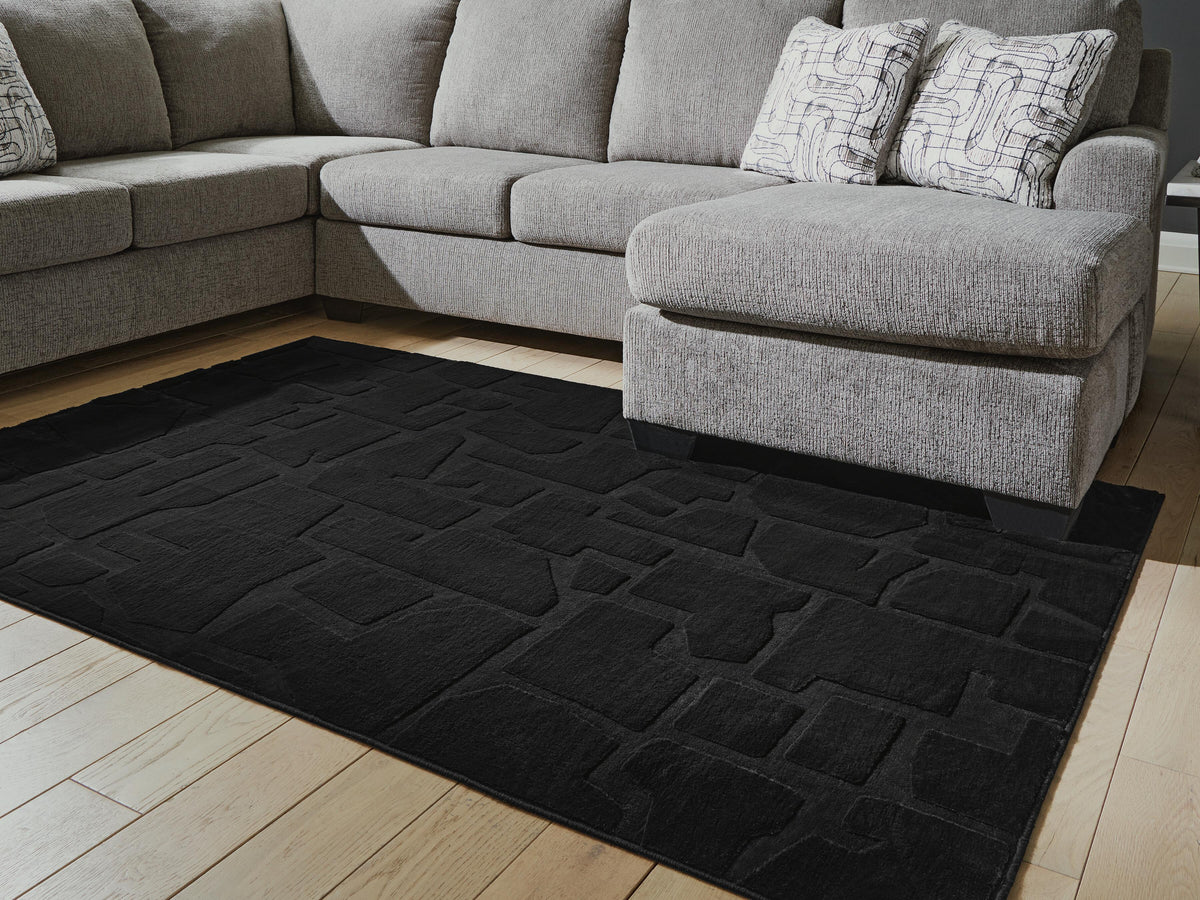 Gibbswell Washable 5' x 7' Area Rug - Jack’s Furniture and More (Laredo, TX)
